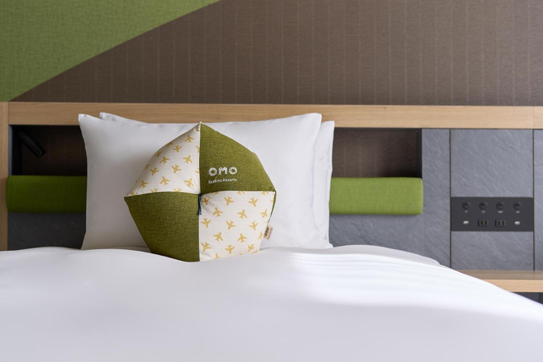 Omo Kansai Airport By Hoshino Resorts Izumisano Bagian luar foto OYO's signature pillow