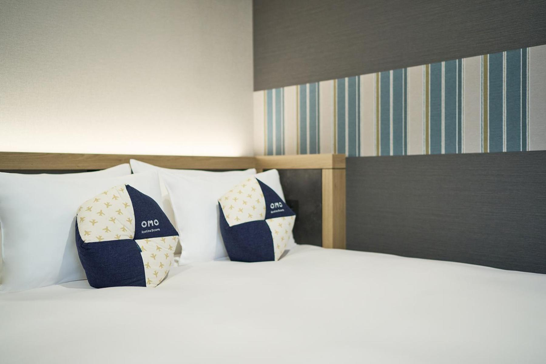 Omo Kansai Airport By Hoshino Resorts Izumisano Bagian luar foto A bed at a hotel